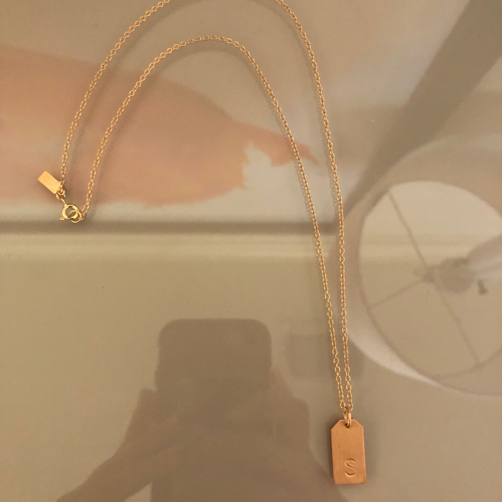 Gold S tag necklace
